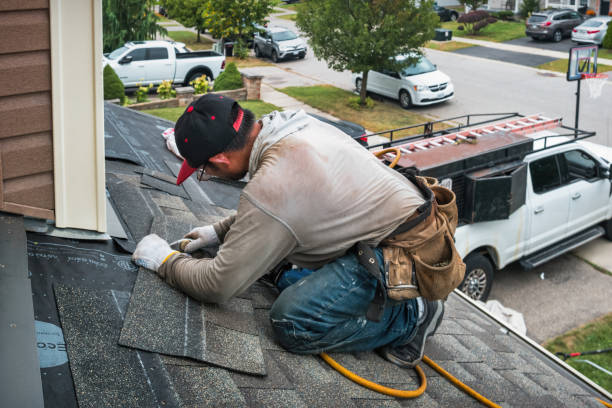 Professional Roofing technician working in Ellwood City, PA